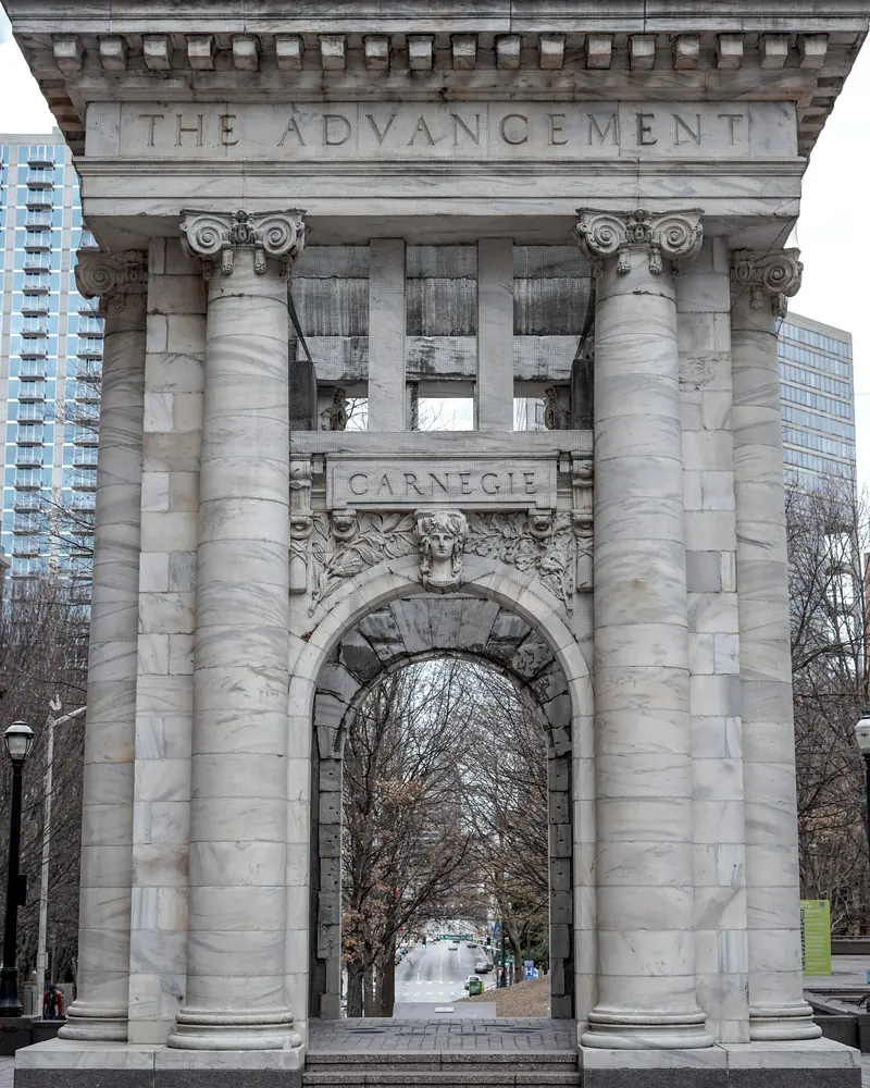 The Carnegie Education Pavilion in Atlanta: a stone arch framed by fluted columns.